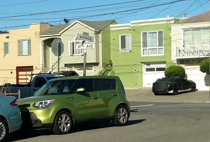 green car outer sunset